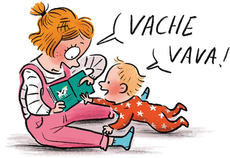 Une petite fille montre à un bébé l'image d'une vache sur un livre.