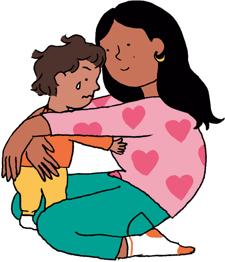Une maman console son tout-petit qui pleure.